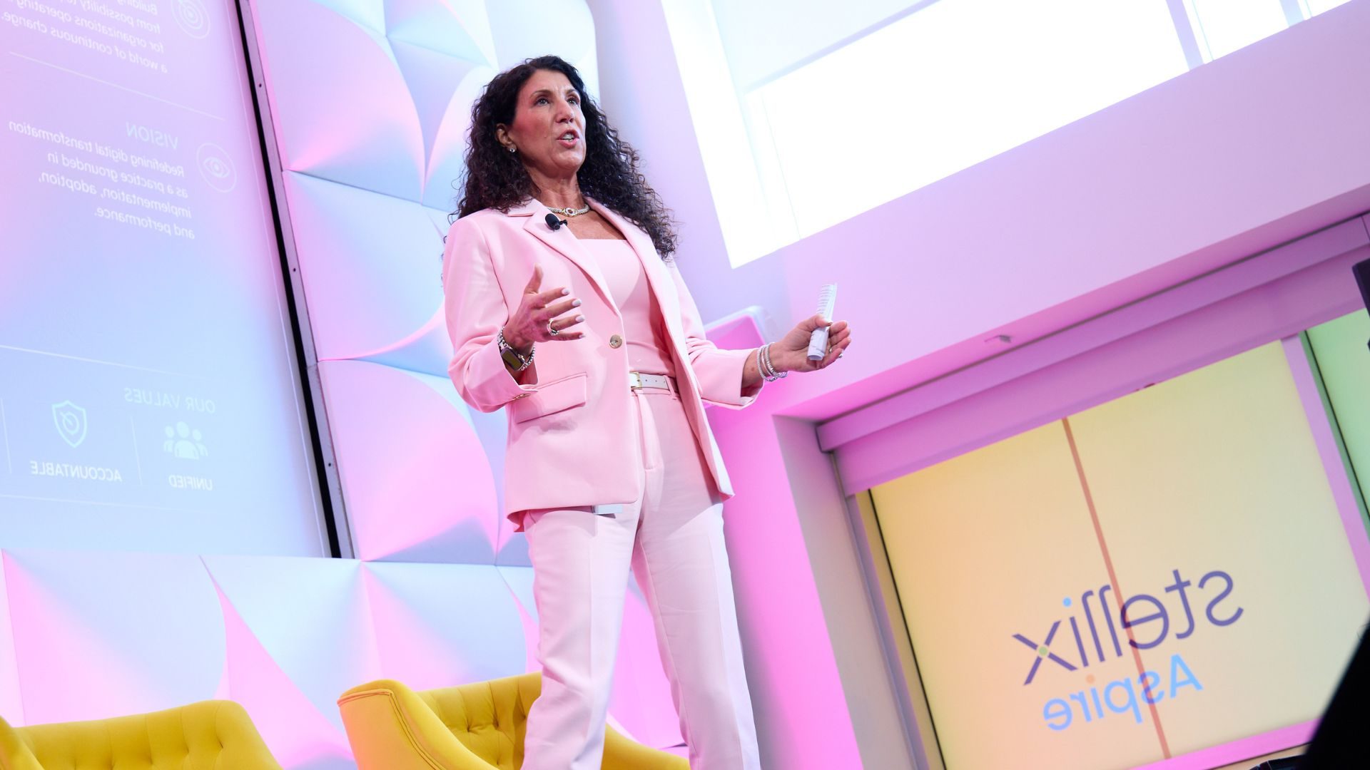 Jenn Azar speaking at Stellix Aspire Event